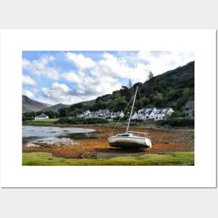 A yacht at rest on the shoreline at Lochranza Posters and Art